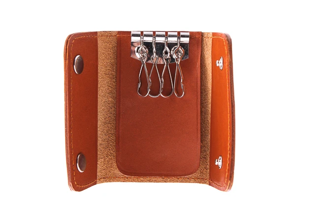 Skórzane etui na klucze vintage kluczykówka VOOC Vintage P10. Kluczówka jest tak zaprojektowana aby zajmowała jak najmniej miejsca. Zamykana na dwa klipsy wewnątrz cztery uchwyty na klucze.